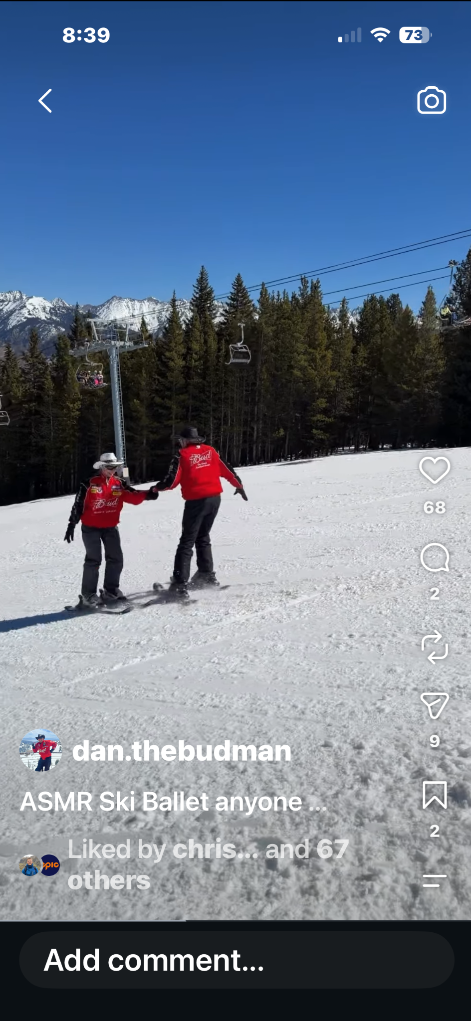 Dan and Trish holding hands while snowdancing beside a chairlift